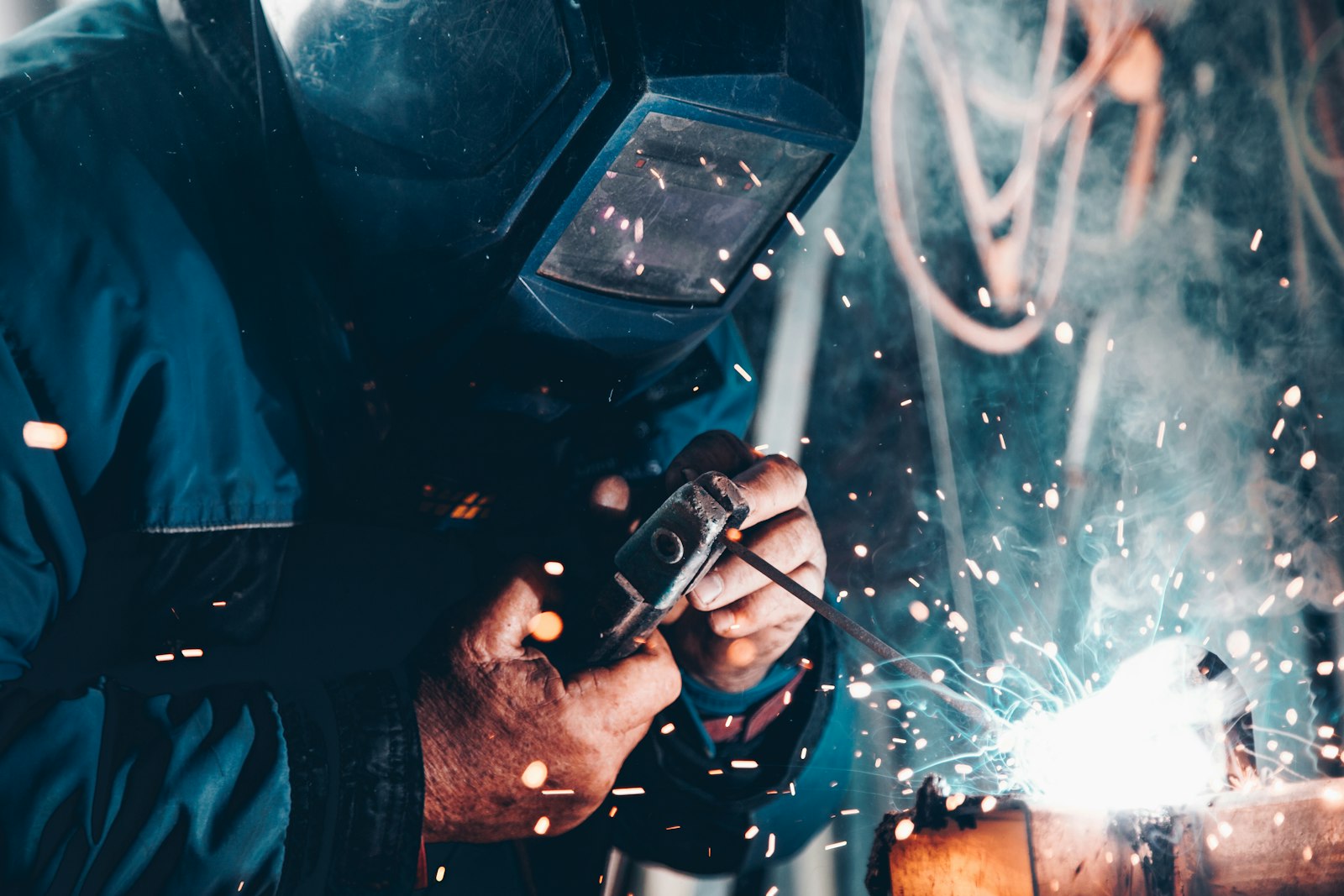Close-up of precision repair work on pipe steel